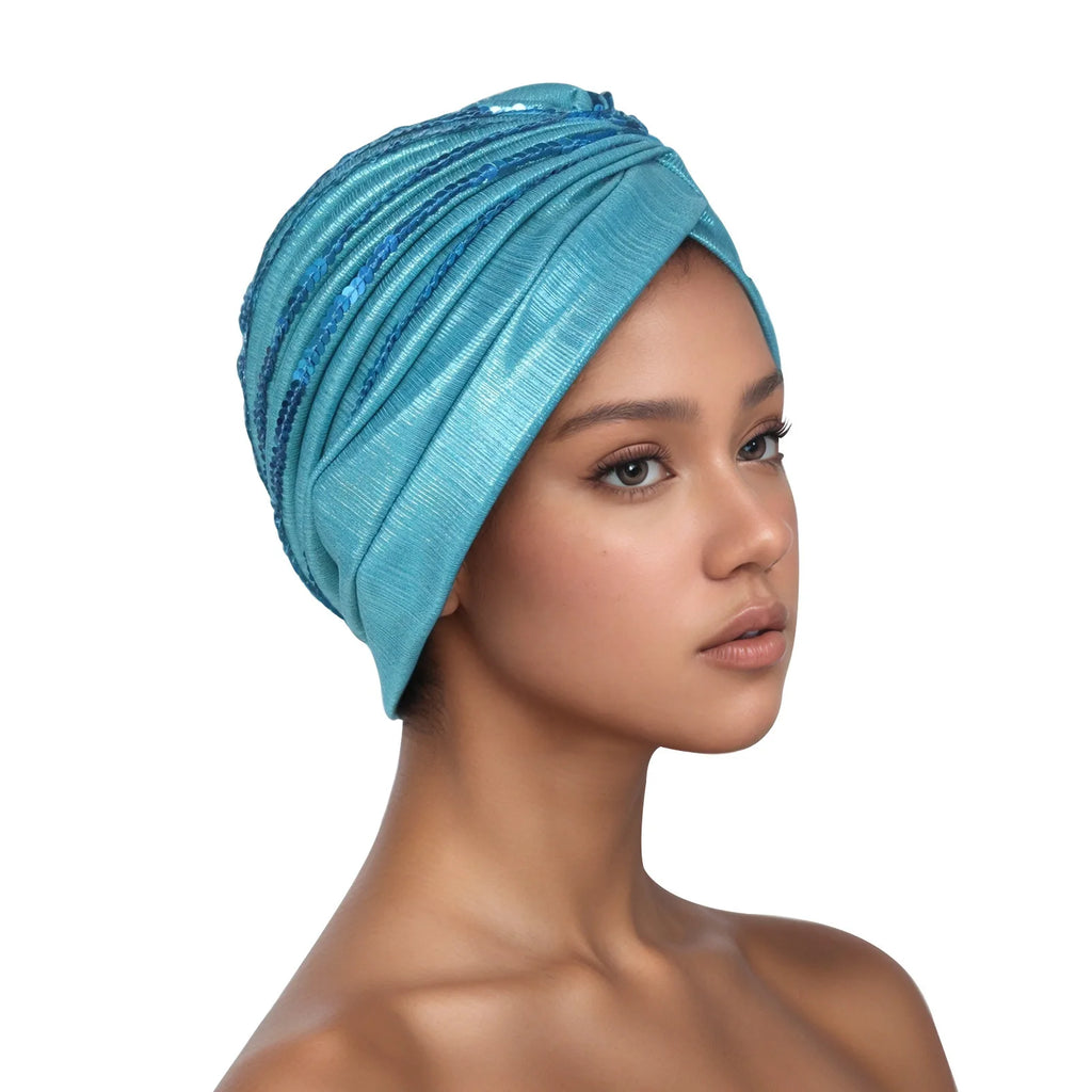 Metallic Head Wrap with matching sequins. You can dress this up or dress it down, but you will always feel like a queen when you put it on.